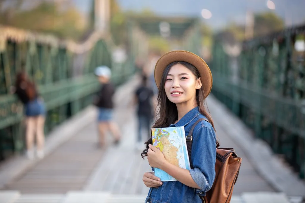 female-tourists-hand-have-happy-travel-map - Copy